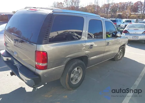 2002 Chevrolet Tahoe Lt from USA, damaged, VIN 1GNEC13Z42R243992